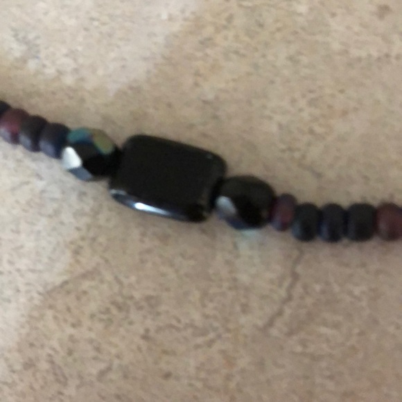 This fun necklace is strung on a stretchy twine - Picture 3 of 4